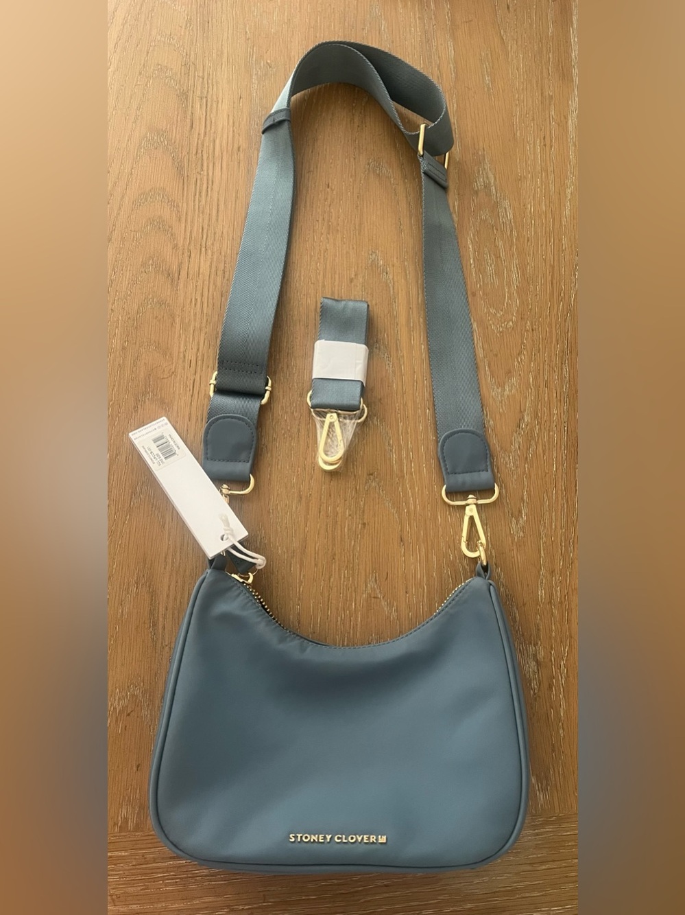 Stoney Clover curved crossbody purse